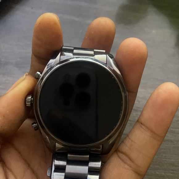 This is a Sam’ssung touch screen Michael Kora Watch - Picture 3 of 3